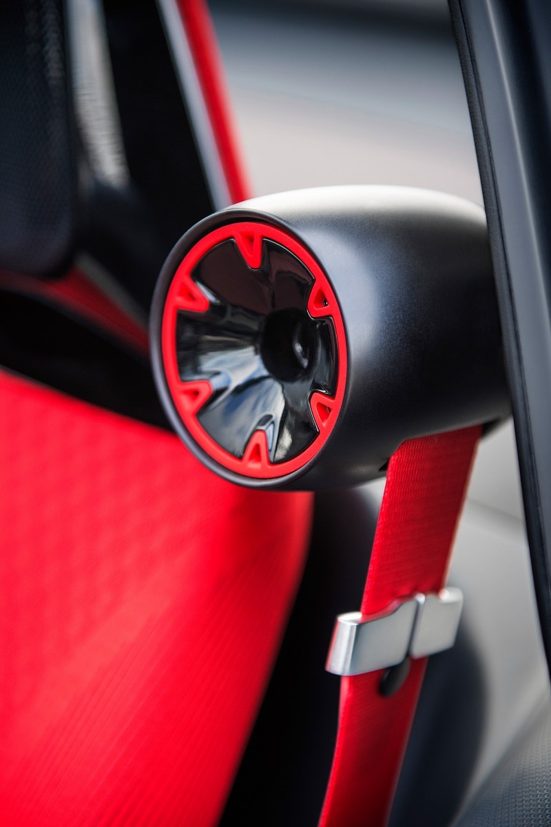 Works of art: The shining red seatbelt retractors follow the design of the red front tires.